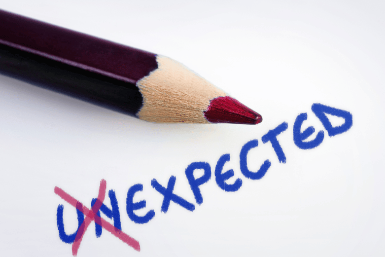 A pencil has altered the word from unexpected to expected